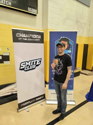 Brian Byrd poses with a Best Model prize at Scorched Earth Open 2026