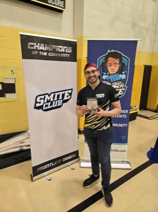 Edwin Mehta poses with a Best Imperium prize at Scorched Earth Open 2026