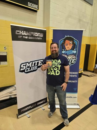 Greg Goss poses with a Best Chaos prize at Scorched Earth Open 2026
