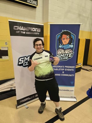 Durante Bozzini poses with a Best Xenos prize at Scorched Earth Open 2026